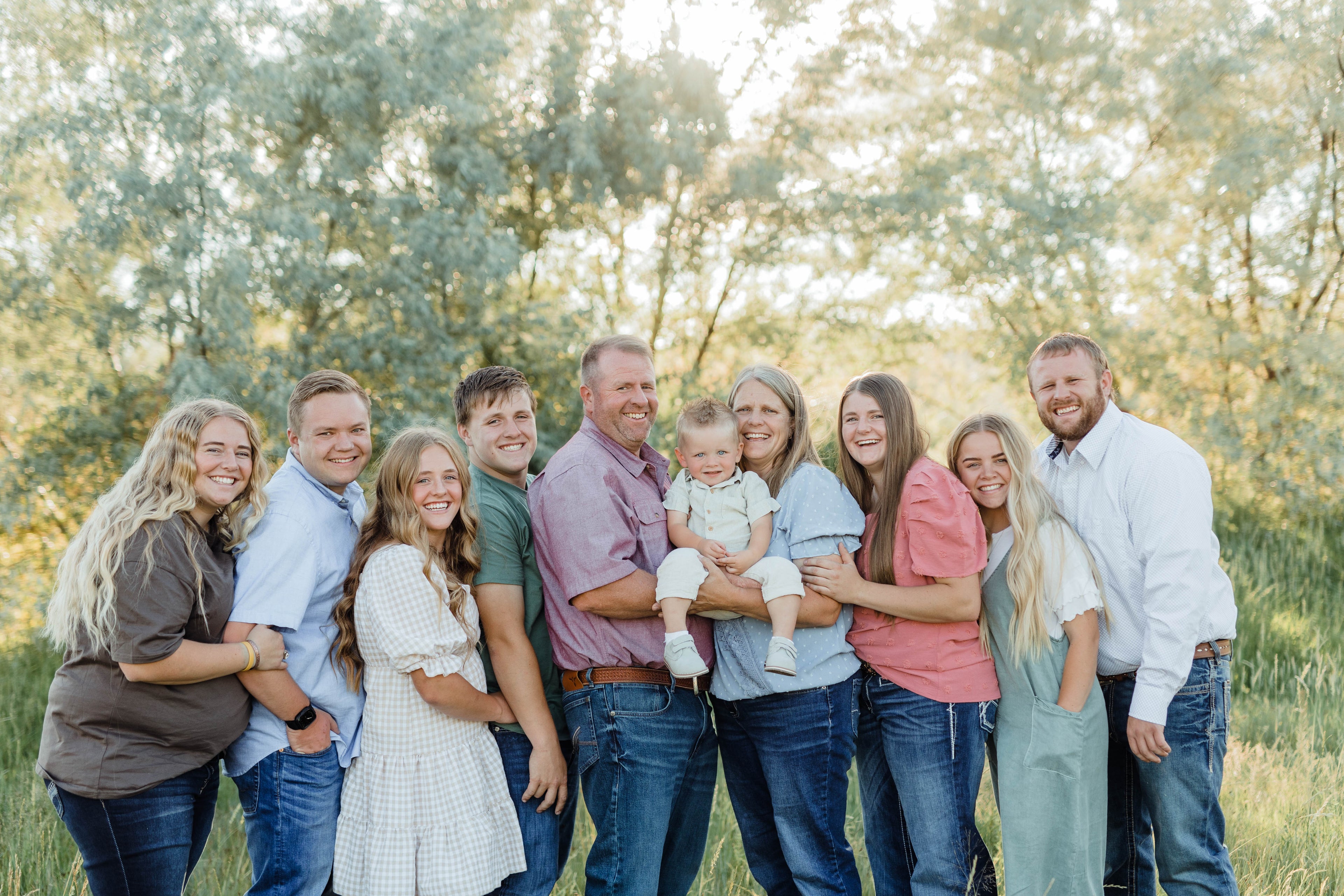 Peterson Family in Southern Utah on Wagyu Cattle grazing area with grass and russian olive trees